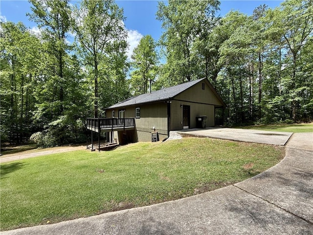 93 Mill Creek Rd, Hiram, GA 30141 - view of side of property featuring a yard, a wooden deck, and concrete driveway