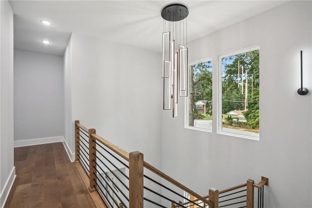 staircase featuring hardwood / wood-style flooring