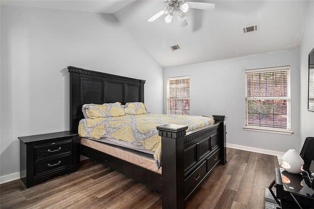 bedroom with lofted ceiling, dark hardwood / wood-style floors, and ceiling fan