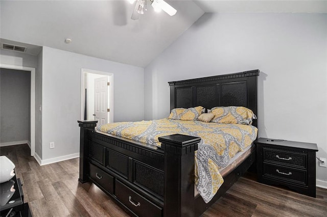 bedroom featuring lofted ceiling, dark wood-type flooring, and ceiling fan