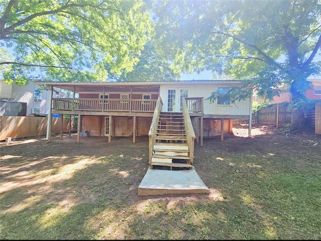 1150 Goldsmith Rd, Stone Mountain, GA 30083 - rear view of house featuring stairs, a deck, a fenced backyard, and french doors