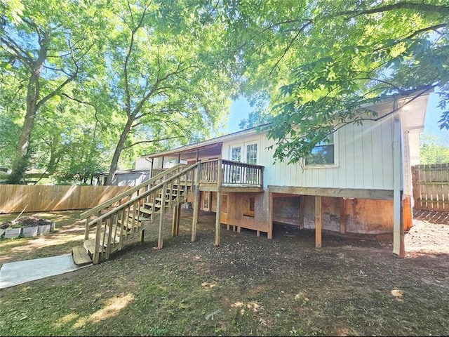 1150 Goldsmith Rd, Stone Mountain, GA 30083 - back of property featuring stairs and a deck