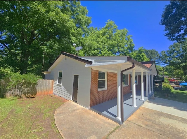 1150 Goldsmith Rd, Stone Mountain, GA 30083 - view of side of property featuring brick siding