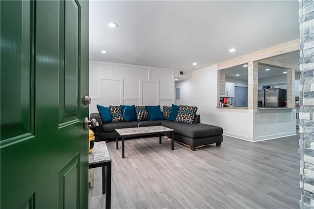 living room with wood-type flooring