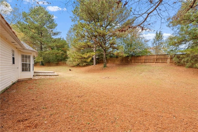 view of yard featuring a fenced backyard