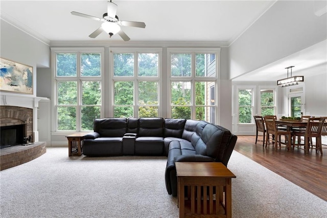 32 Pullman Trl, Acworth, GA 30101 - living room with ornamental molding, a fireplace, a ceiling fan, and carpet flooring