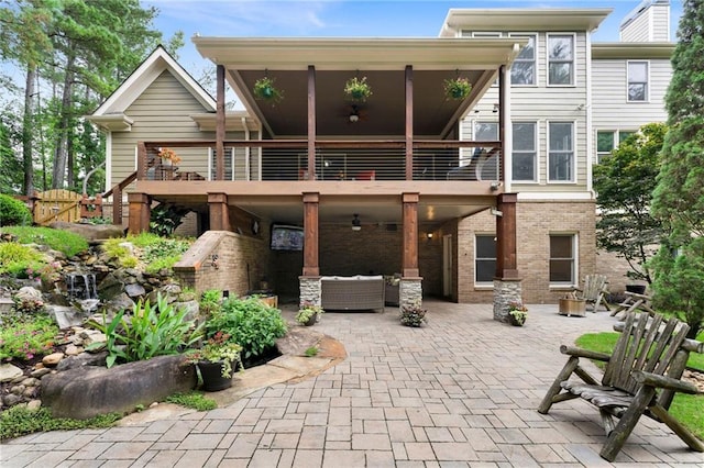 32 Pullman Trl, Acworth, GA 30101 - rear view of property with an outdoor living space, a patio, and brick siding