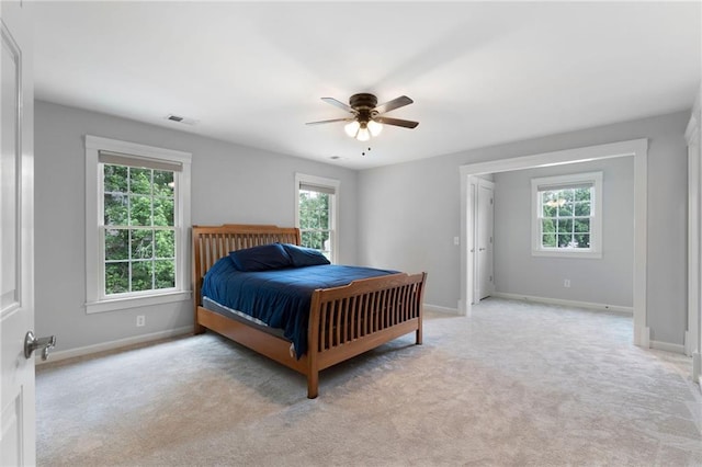 32 Pullman Trl, Acworth, GA 30101 - bedroom with multiple windows, light colored carpet, and a ceiling fan