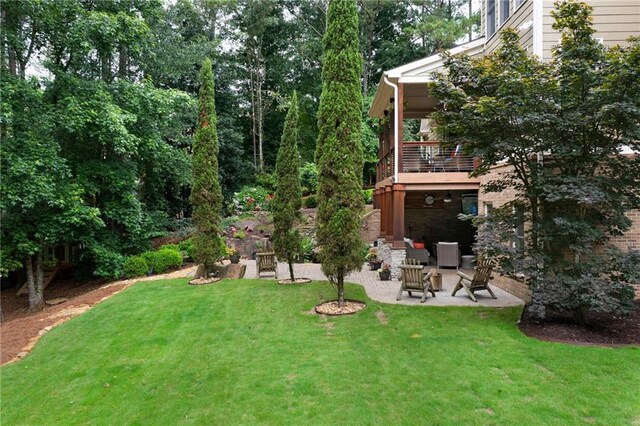 32 Pullman Trl, Acworth, GA 30101 - view of green lawn featuring a patio
