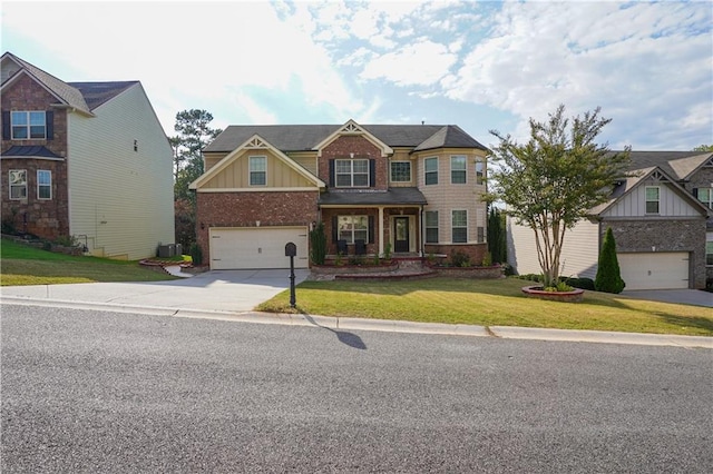 craftsman-style house with a front lawn and a garage