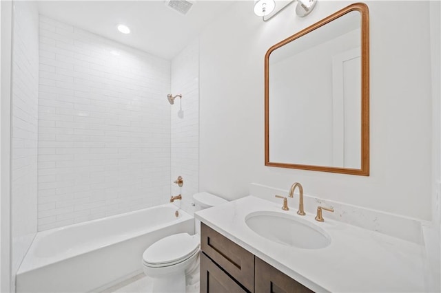full bath with toilet, vanity, and tub / shower combination