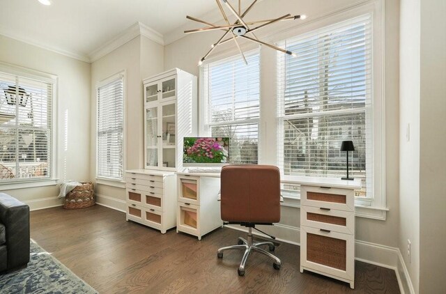 home office with a chandelier, dark wood-type flooring, baseboards, and crown molding