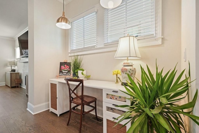 office area with dark wood-style flooring, crown molding, and baseboards