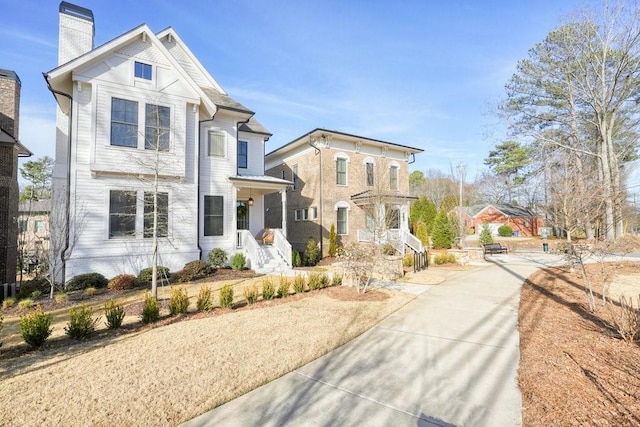 view of front of property featuring a chimney