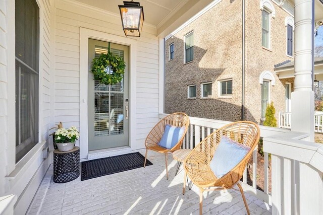 property entrance featuring covered porch