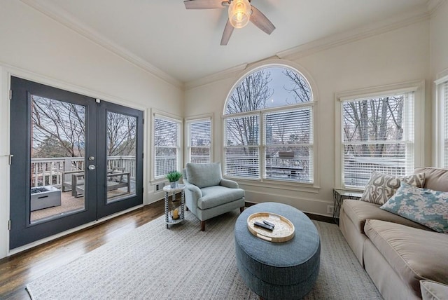 sunroom with ceiling fan and french doors