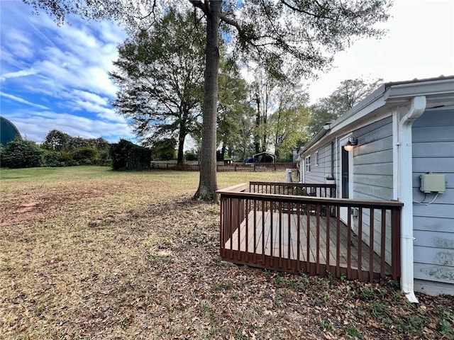 view of yard featuring a wooden deck