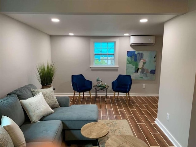 living area with a wall mounted AC and dark hardwood / wood-style flooring