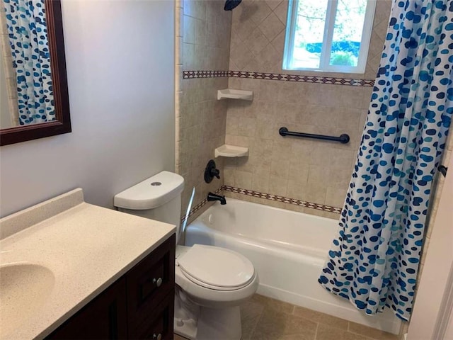 full bathroom with toilet, vanity, shower / bath combination with curtain, and tile patterned floors