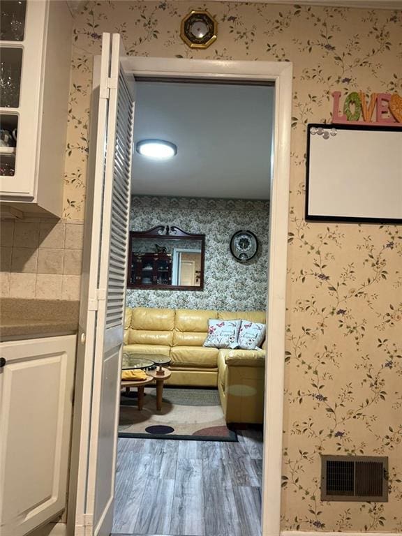 1017 Clifton Dr, Macon, GA 31204 - interior space featuring wood finished floors and wallpapered walls
