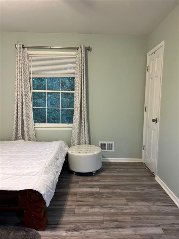 1017 Clifton Dr, Macon, GA 31204 - bedroom featuring wood finished floors and baseboards