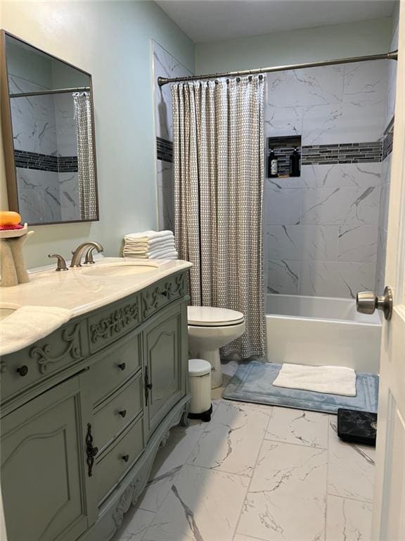 1017 Clifton Dr, Macon, GA 31204 - bathroom featuring vanity, toilet, shower / bath combo, and marble look tile flooring