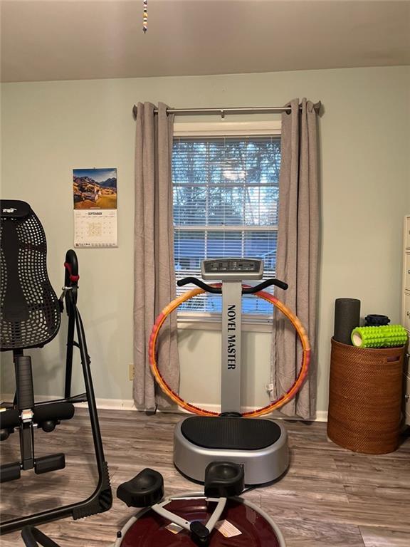 1017 Clifton Dr, Macon, GA 31204 - workout room featuring wood finished floors and baseboards