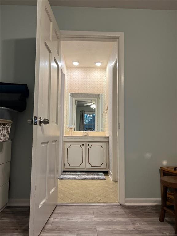 1017 Clifton Dr, Macon, GA 31204 - corridor with baseboards and light wood-style flooring