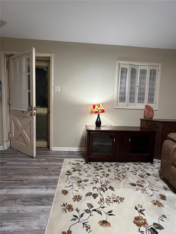 1017 Clifton Dr, Macon, GA 31204 - living area featuring baseboards and wood finished floors