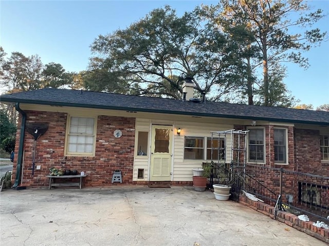 1017 Clifton Dr, Macon, GA 31204 - view of front of property featuring brick siding and a patio area
