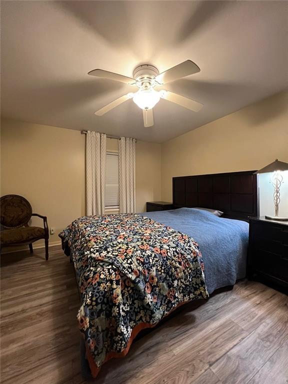 1017 Clifton Dr, Macon, GA 31204 - bedroom featuring wood finished floors and ceiling fan
