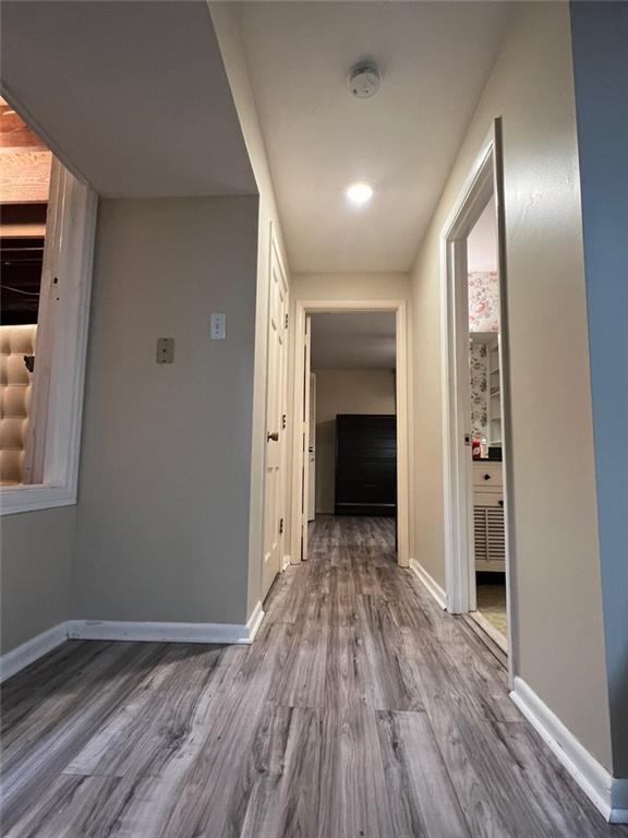 1017 Clifton Dr, Macon, GA 31204 - hallway featuring wood finished floors and baseboards