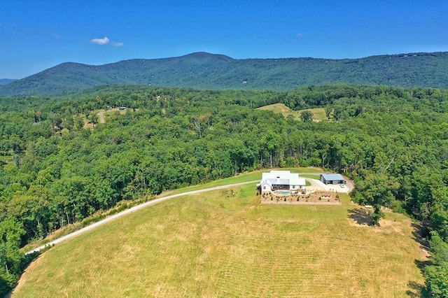 drone / aerial view featuring a mountain view