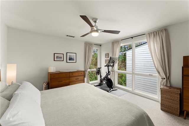 1382 Stirling Cir NW, Atlanta, GA 30318 - bedroom with ceiling fan, visible vents, and light carpet