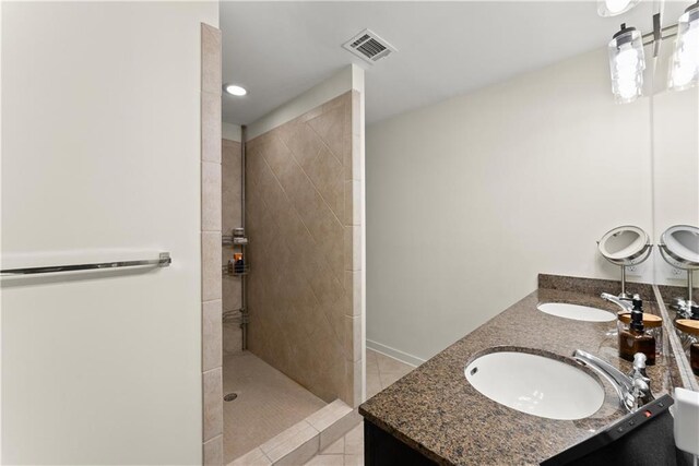 1382 Stirling Cir NW, Atlanta, GA 30318 - full bath featuring a walk in shower, a sink, tile patterned flooring, visible vents, and double vanity