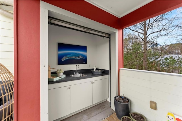 1382 Stirling Cir NW, Atlanta, GA 30318 - interior space featuring a sink, wet bar, and light wood finished floors