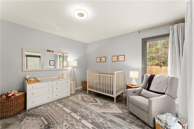 1382 Stirling Cir NW, Atlanta, GA 30318 - bedroom featuring a nursery area