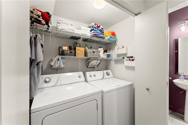1382 Stirling Cir NW, Atlanta, GA 30318 - laundry area with washing machine and dryer, laundry area, and a sink