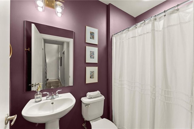 1382 Stirling Cir NW, Atlanta, GA 30318 - bathroom featuring toilet and a sink