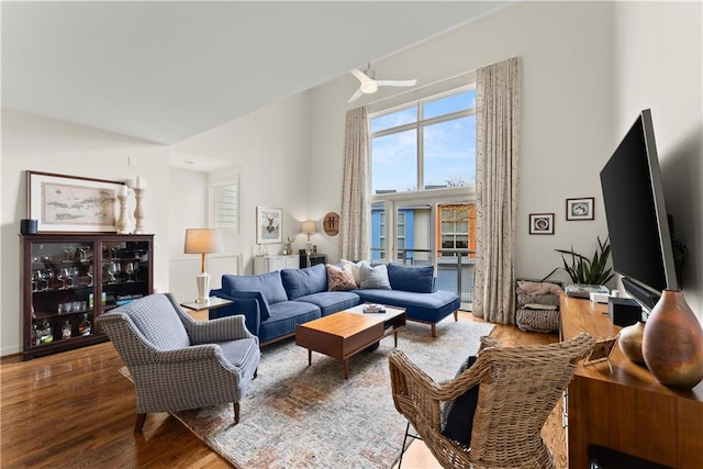 1382 Stirling Cir NW, Atlanta, GA 30318 - living area featuring a high ceiling, ceiling fan, and wood finished floors