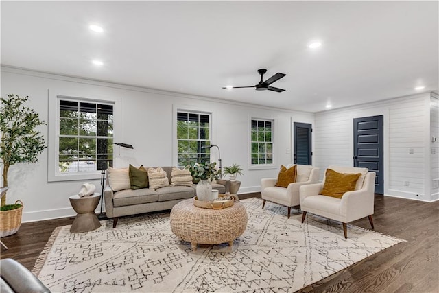 living room featuring ceiling fan, crown molding, and hardwood / wood-style floors