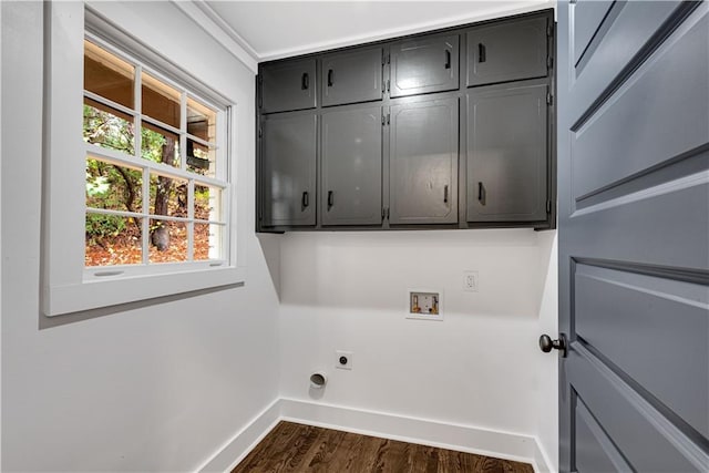 laundry area featuring washer hookup, cabinets, dark hardwood / wood-style flooring, and hookup for an electric dryer