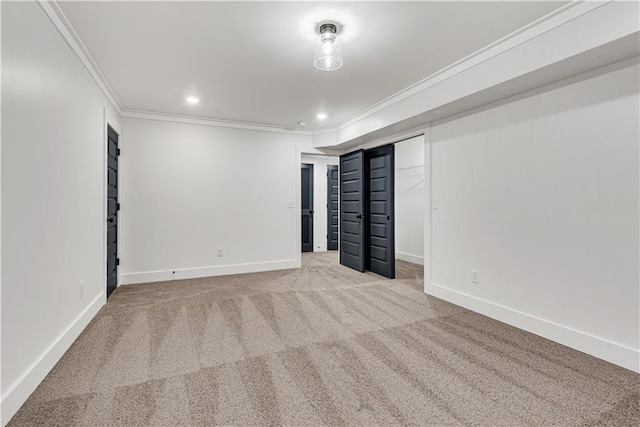 interior space with carpet flooring and crown molding