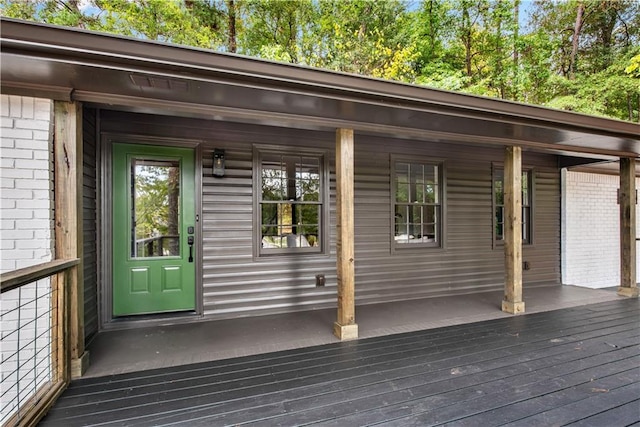 wooden terrace with a porch