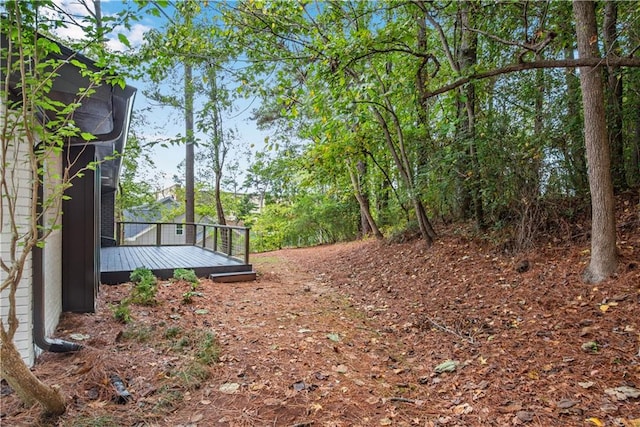 view of yard featuring a deck