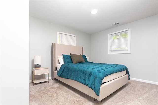 bedroom featuring carpet floors, baseboards, recessed lighting, and visible vents