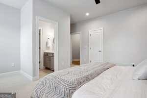 247 Widener Way, Peachtree City, GA 30269 - bathroom with a stall shower, a bath, and a spacious closet