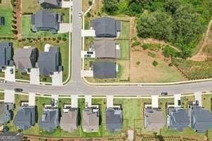 247 Widener Way, Peachtree City, GA 30269 - french country inspired facade with driveway and an attached garage