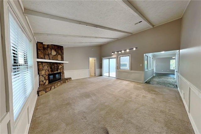 2041 Kramer Way, Marietta, GA 30062 - unfurnished living room with carpet floors, a textured ceiling, a fireplace, beam ceiling, and wainscoting