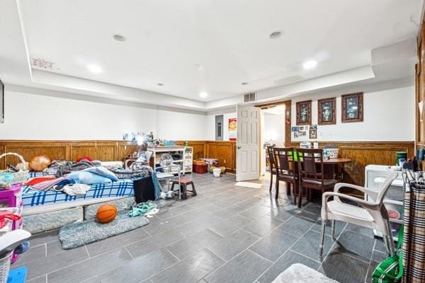 living room with a raised ceiling